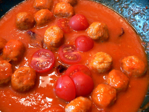 Tomatenhälften mit in die Soße