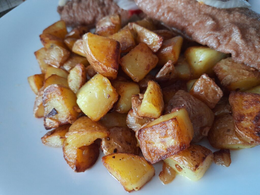 Bratkartoffeln mit Brathering (sauer eingelegt)