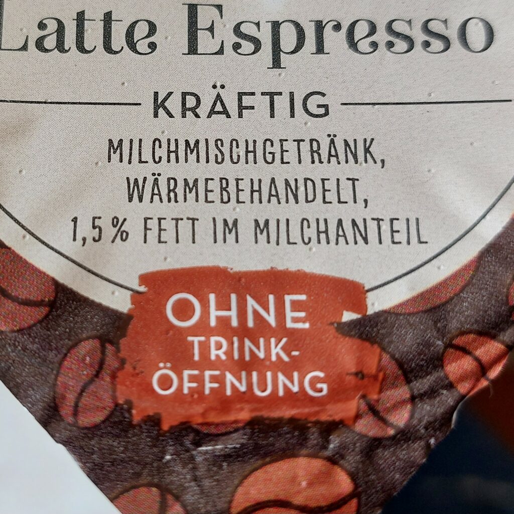 Deckel eines Latte Espresso (Milchmischgetränk)