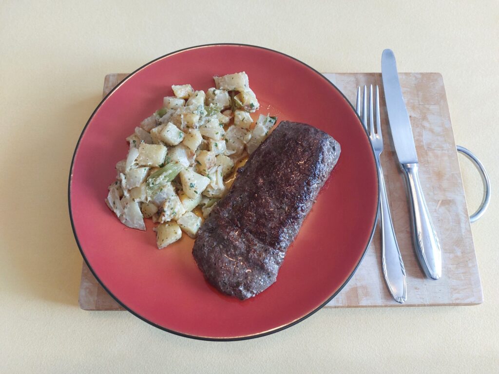 Lammlachs an Kohlrabi-Kartoffel-Zwiebel-Schmand