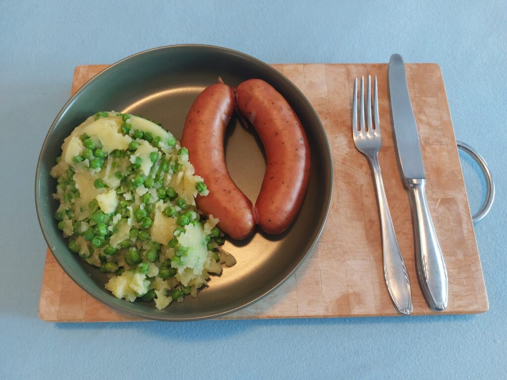 Krainer Wurst, beerbster Kartoffelbrei
